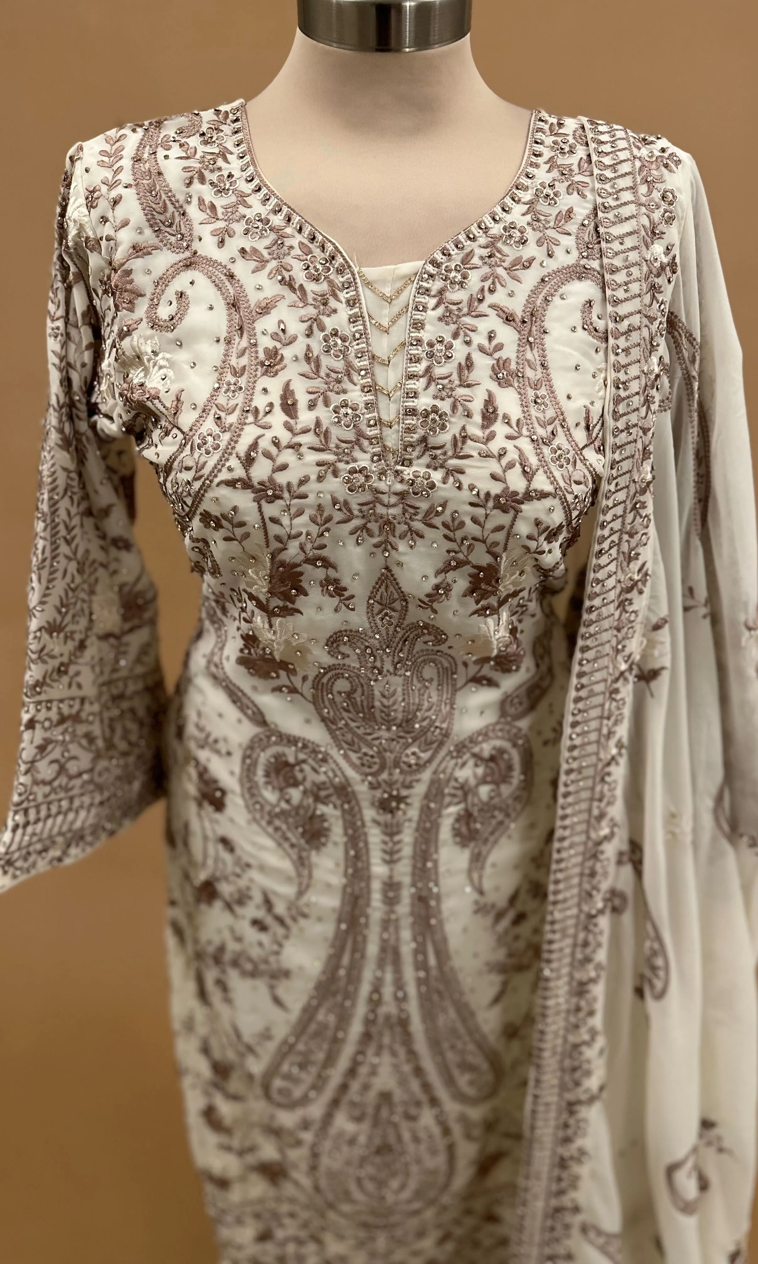 Heavy Stone Work Embroiderey Off White Color Suit With Pants On Bottom